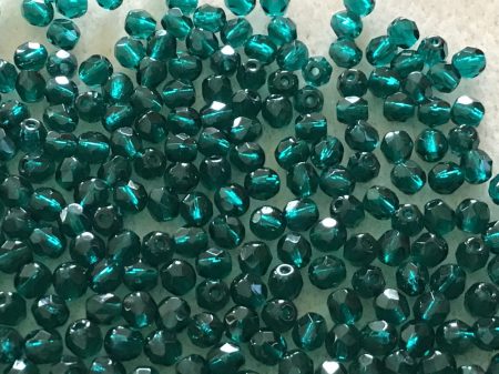 50740-4 mm csiszolt sötét emerald